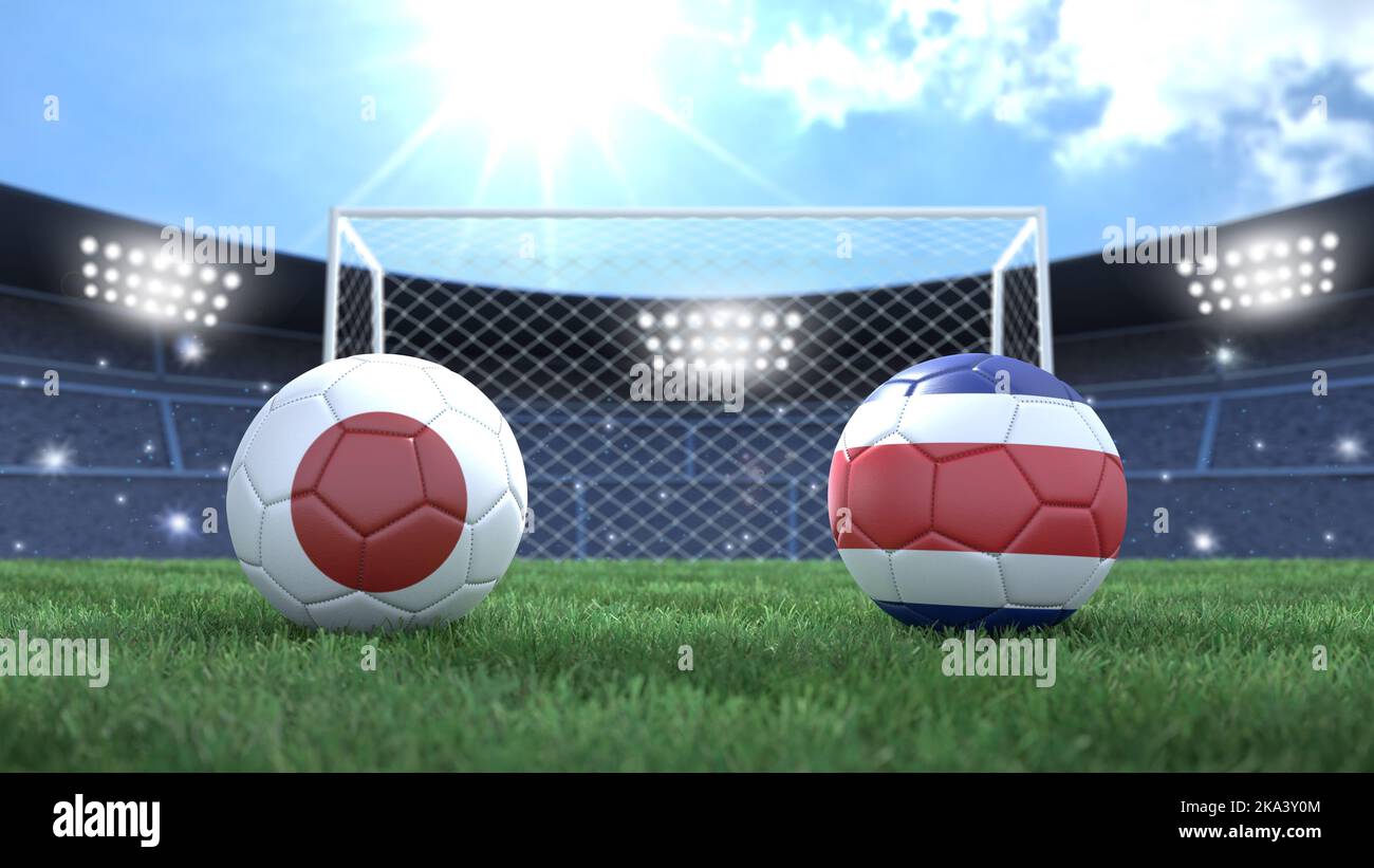Due palline da calcio con bandiere colorate sullo sfondo luminoso sfocato dello stadio. Giappone e Costa Rica. immagine 3d Foto Stock