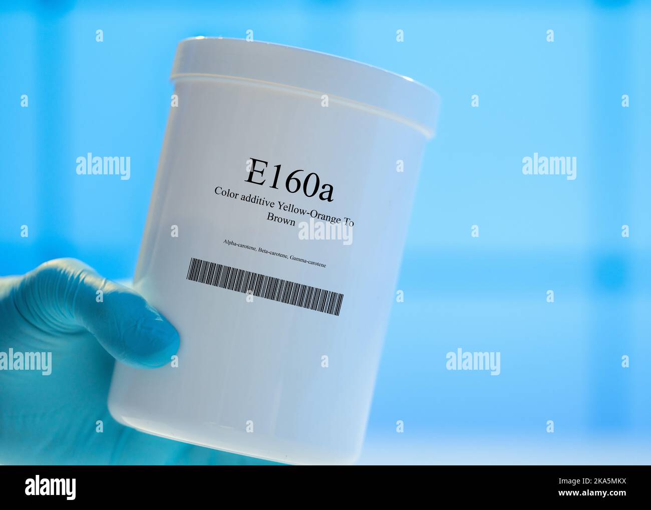 Confezione con supplementi nutrizionali E160a additivo colore giallo-arancio a marrone Foto Stock