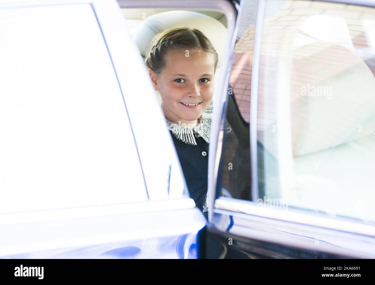 OSLO 20130913. Il principe ereditario Haakon, la principessa ereditaria mette-Marit e la principessa Ingrid Alexandra sono stati ricevuti su piste verdi quando la nuova casa ambiente ha aperto a Oslo venerdì. La nuova casa dell'ambiente si trova in via Mariboes, nel centro di Oslo, e contiene molte delle più importanti organizzazioni norvegesi per l'ambiente e lo sviluppo, tra cui l'Associazione per la protezione della natura, la Fondazione per la foresta pluviale e lo sviluppo. Foto: Berit Roald/NTB scanpix Foto Stock