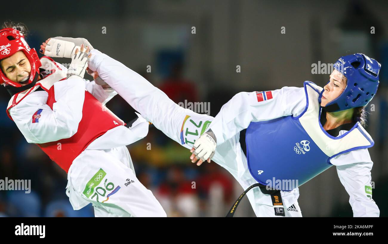 RIO DE JANEIRO, BRASILE 20160820. Olimpiadi estive a Rio nel 2016. Il taekwondo norvegese spera Tina Roe Skaar durante la partita contro il campione olimpico in carica Milica Mandic di Serbia durante il torneo olimpico di Taekwondo nella Carioca Arena di Rio de Janeiro Sabato. Ha perso 2-8. Foto: Heiko Junge / NTB scanpix Foto Stock