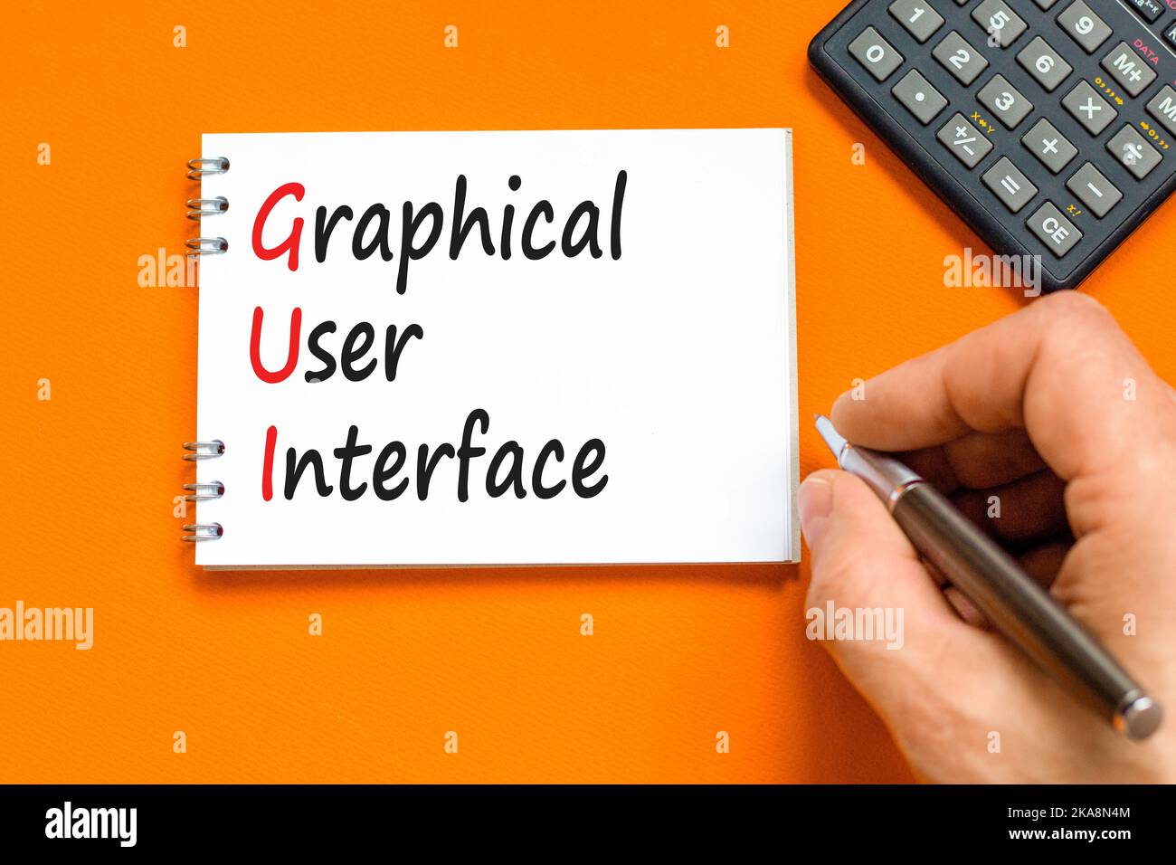 Simbolo dell'interfaccia grafica utente. Interfaccia grafica utente di Concept Words su una nota bianca su un bellissimo sfondo arancione. Grafico aziendale e GUI Foto Stock