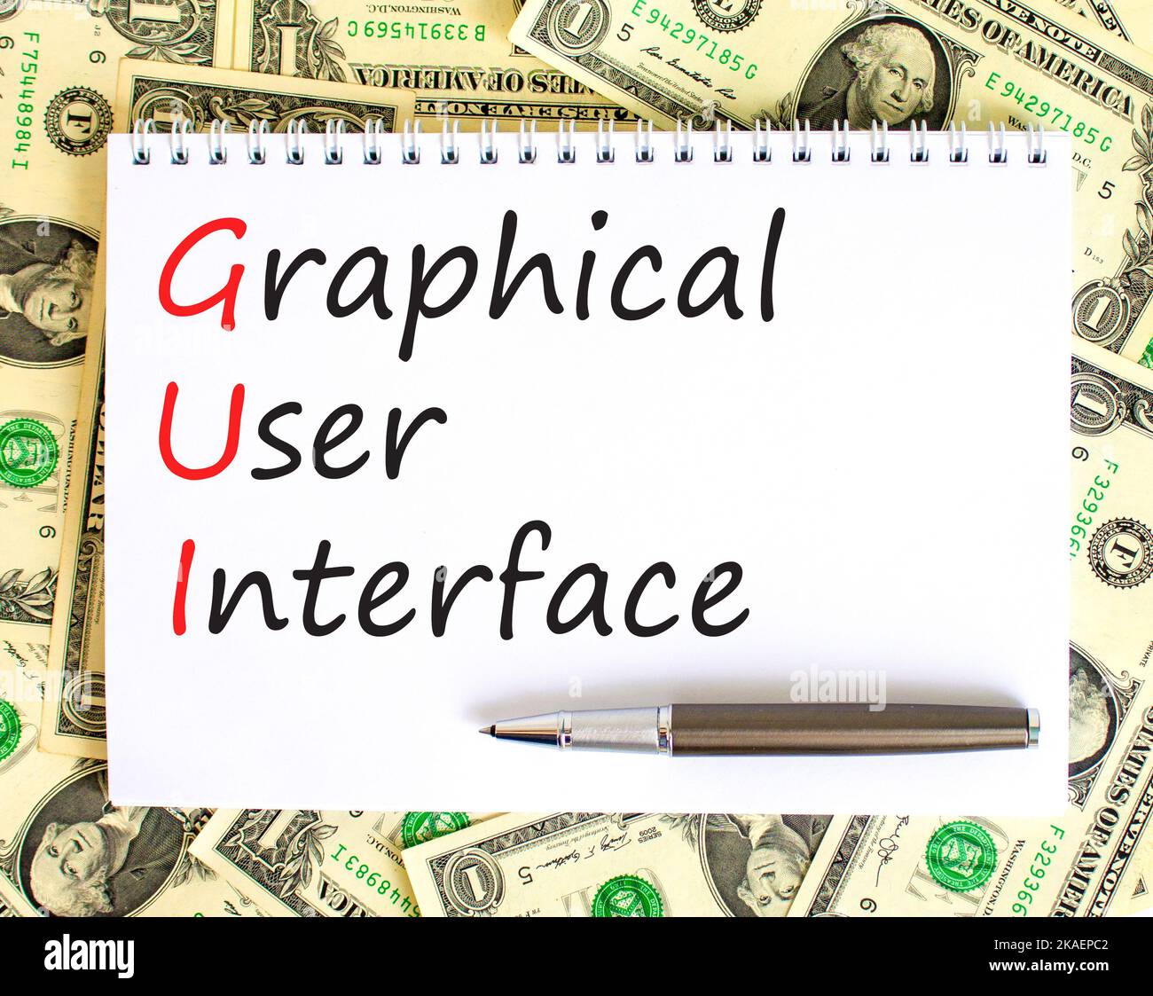 Simbolo dell'interfaccia grafica utente. Concept Words GUI interfaccia grafica utente su white note su uno sfondo bello da dollari fatture. Business An Foto Stock