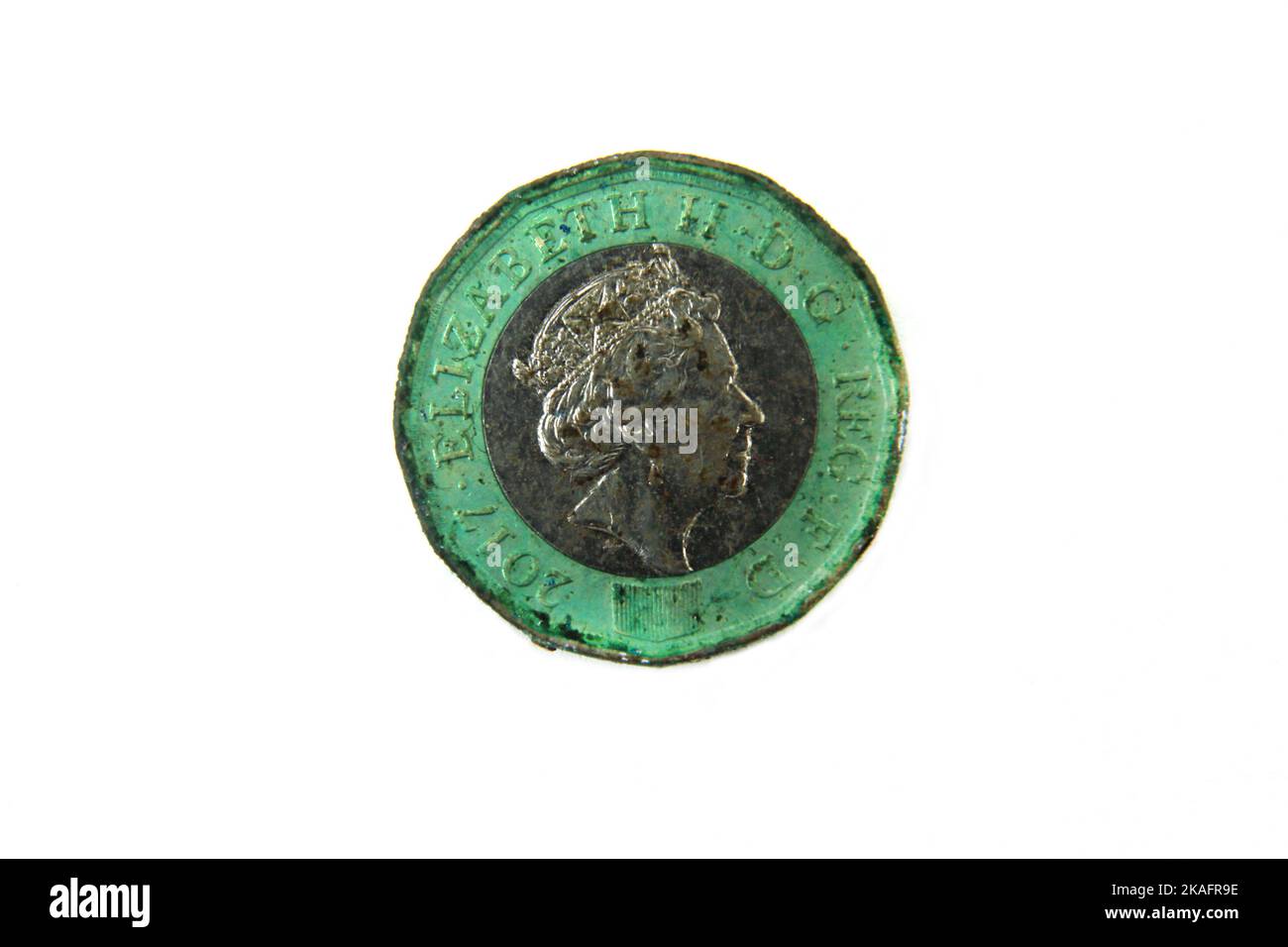 British Pound Coin Going Green da ossidazione Foto Stock