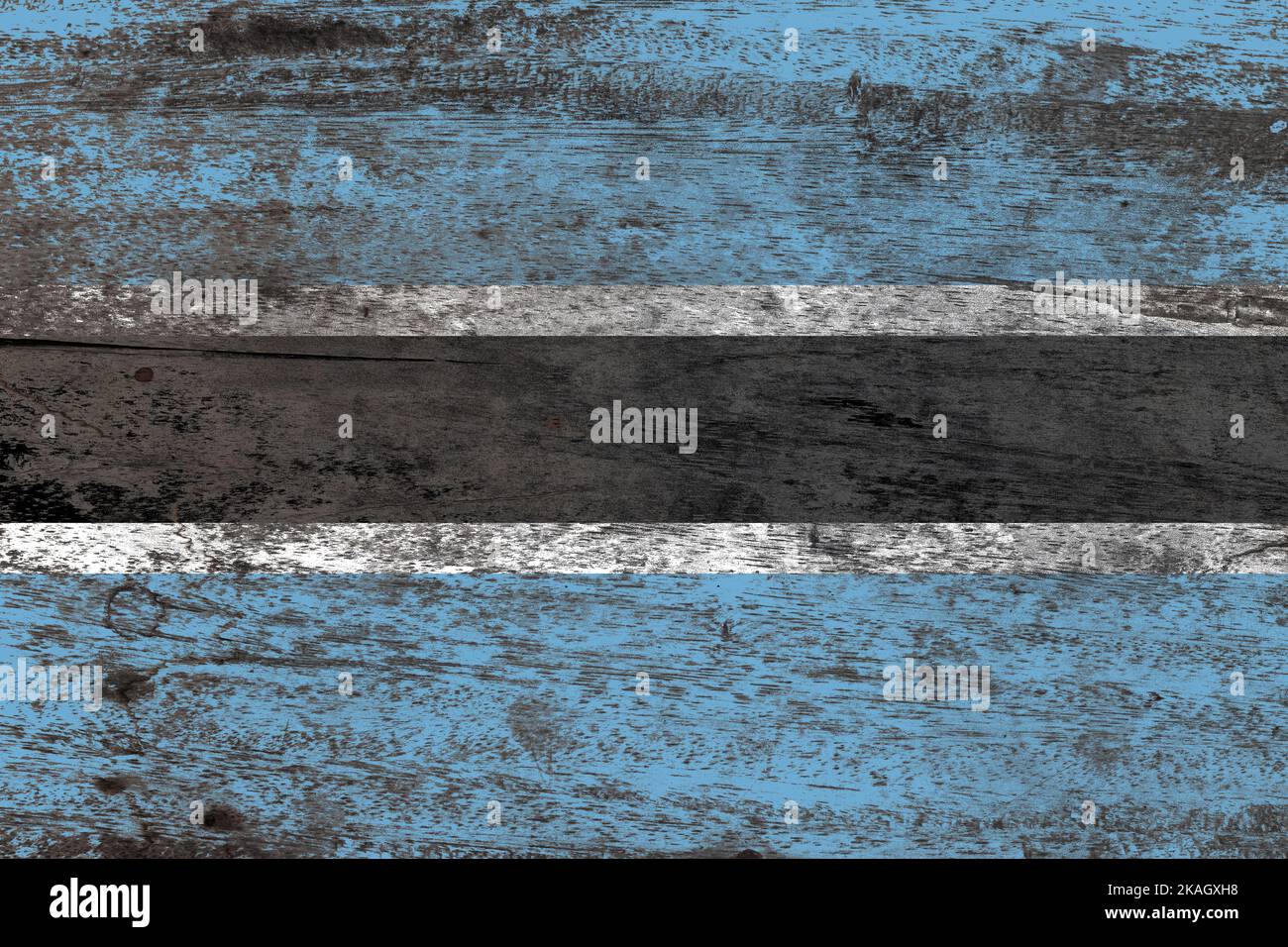 Bandiera del Botswana dipinta su un vecchio sfondo di legno danneggiato Foto Stock