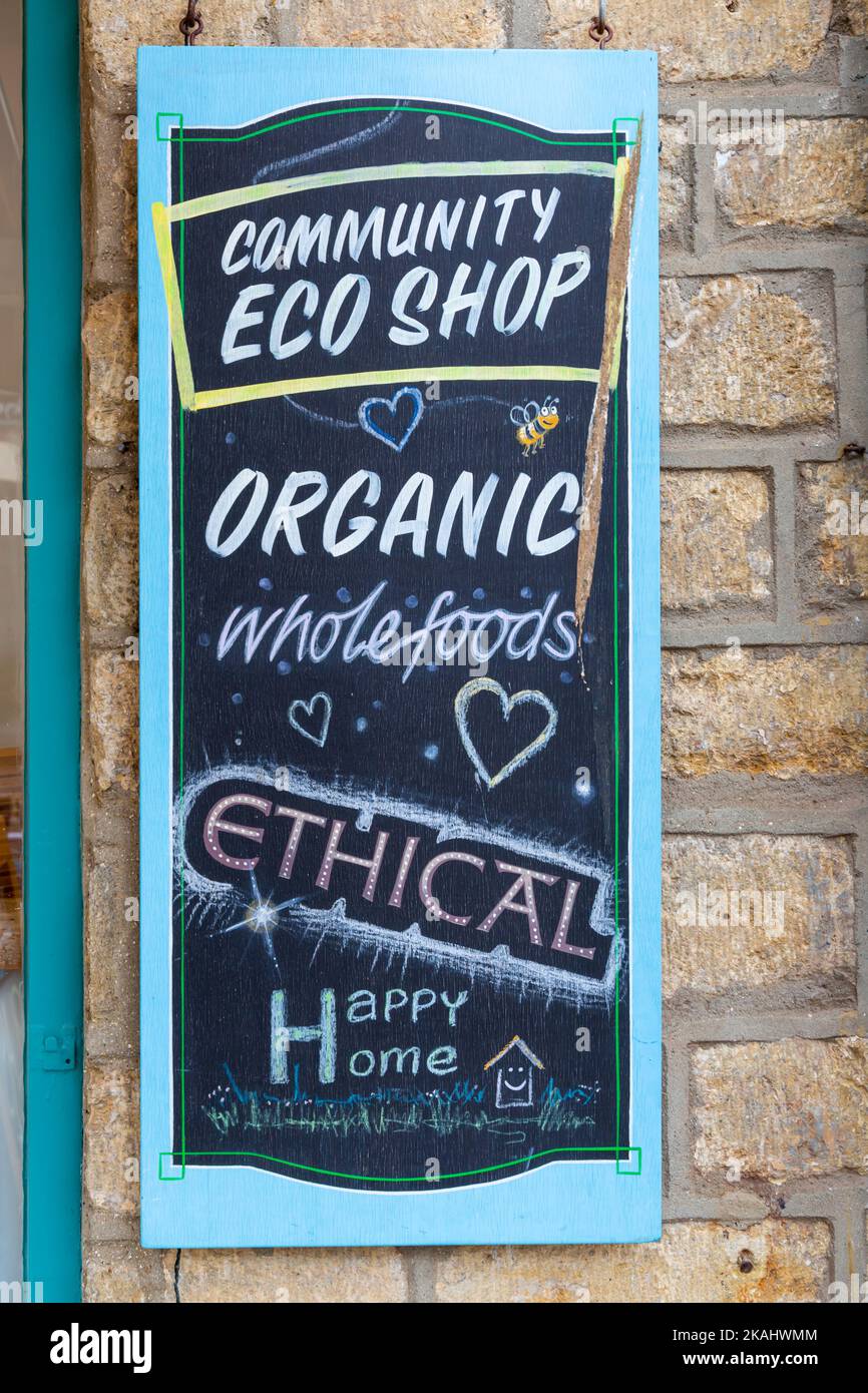 Community Eco Shop alimenti biologici interi etica felice casa segno a Bridport, Dorset UK nel mese di settembre Foto Stock