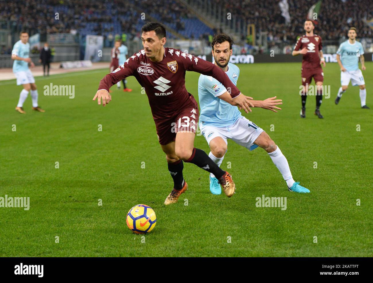 Marco Parolo, Nicolas Burdisso durante la Serie Italiana Una partita di calcio S.S. Lazio contro F.C Torino allo Stadio Olimpico di Roma, il 11 dicembre 2017. (Foto di Silvia Lore/NurPhoto) Foto Stock