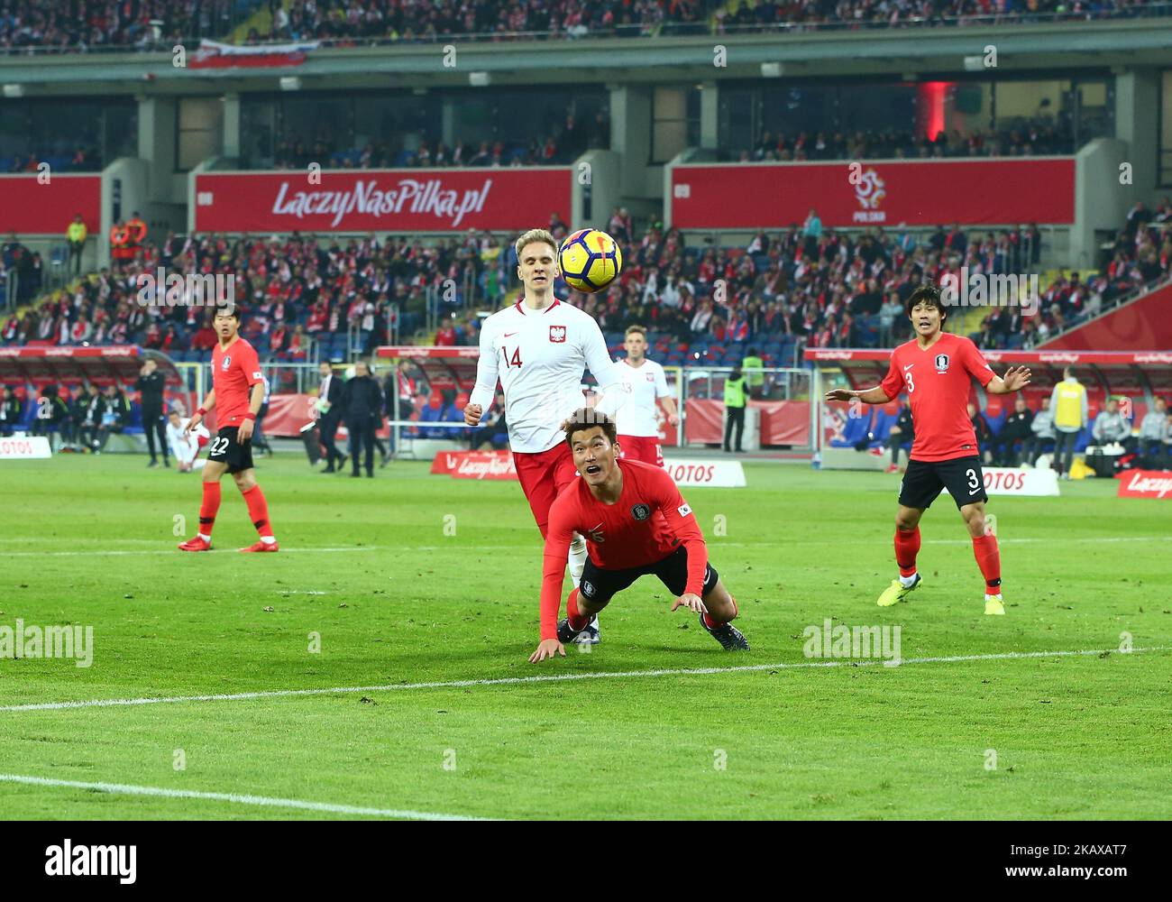 Lukasz Teodorczyk e ? Durante la partita internazionale di calcio amichevole tra la Polonia e le squadre nazionali di calcio della Corea del Sud, presso lo Stadio Slesiano di Chorzow, Polonia, il 27 marzo 2018 (Foto di Mateusz Wlodarczyk/NurPhoto) Foto Stock