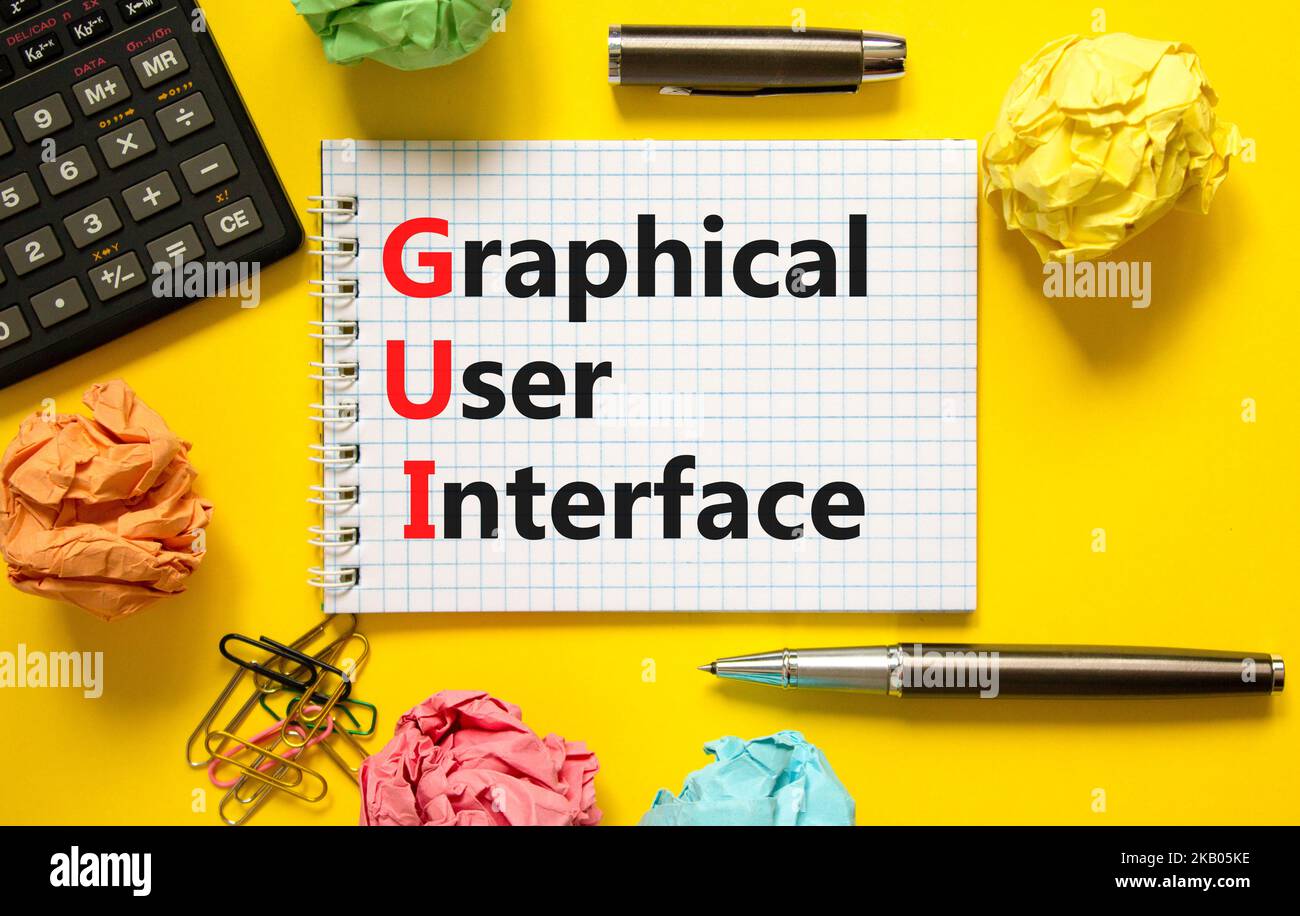 Simbolo dell'interfaccia grafica utente. Interfaccia grafica utente di Concept Words su una nota bianca su un bellissimo sfondo giallo. Grafico aziendale e GUI Foto Stock