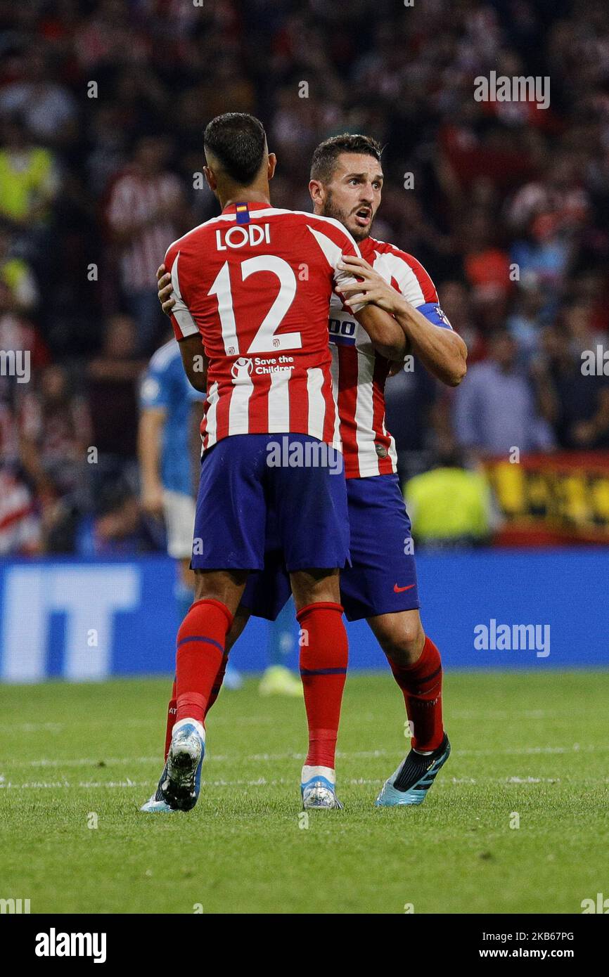 Renan Lodi (L) e Jorge Resurreccion 'Koke' (R) dell'Atletico de Madrid celebrano il gol durante la partita della UEFA Champions League tra Atletico de Madrid e Juventus allo stadio Wanda Metropolitano di Madrid, Spagna. Settembre 18, 2019. (Foto di A. Ware/NurPhoto) Foto Stock