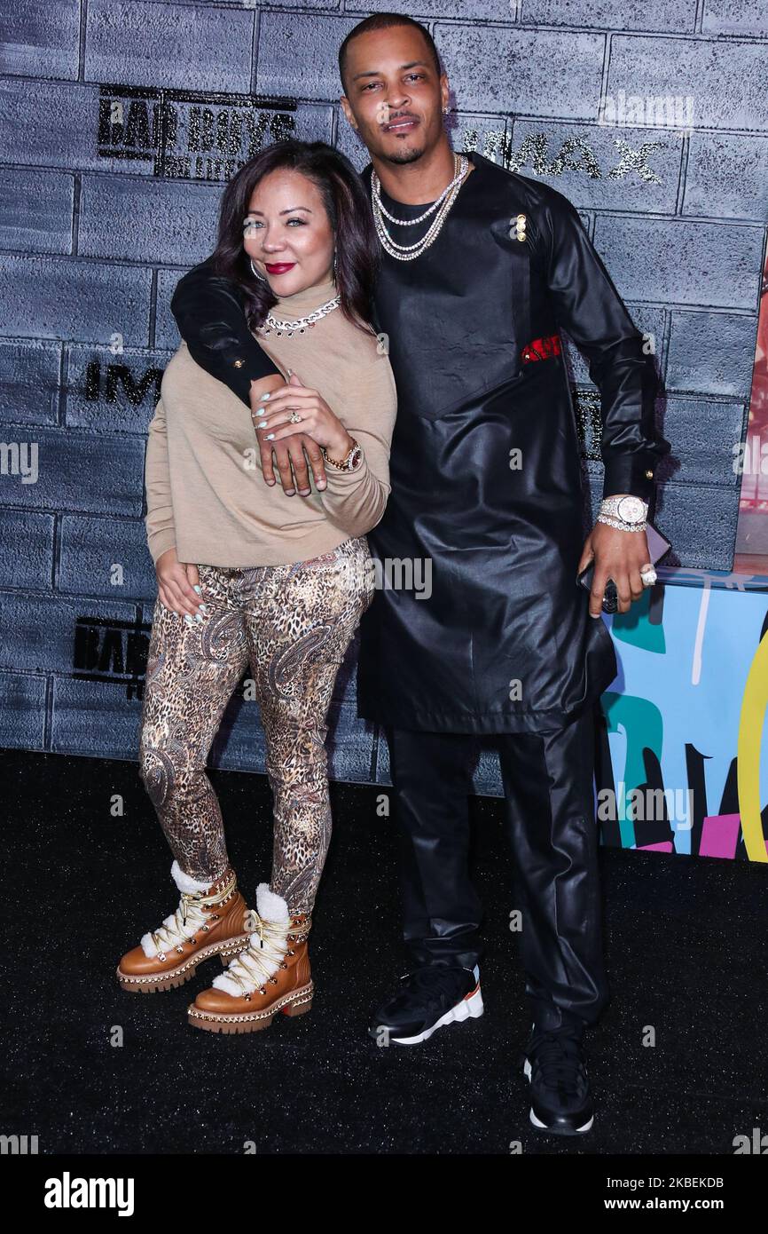 HOLLYWOOD, LOS ANGELES, CALIFORNIA, USA - 14 GENNAIO: Tameka Cottle e T.I. arrivano al Los Angeles Premiere della Columbia Pictures 'Bad Boys for Life' che si tiene al TCL Chinese Theatre IMAX il 14 gennaio 2020 a Hollywood, Los Angeles, California, Stati Uniti. (Foto di Xavier Collin/Image Press Agency/NurPhoto) Foto Stock