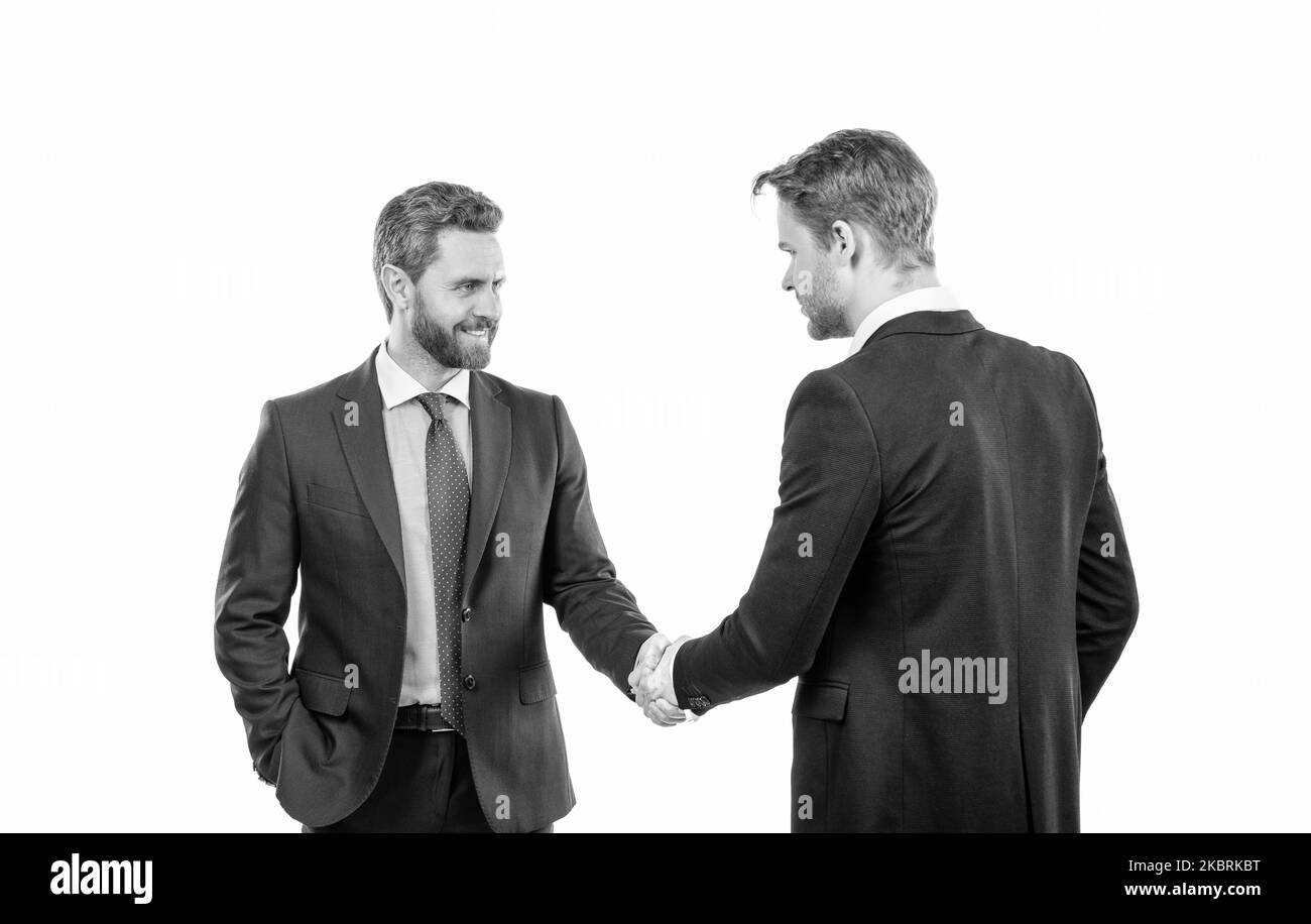 due colleghi d'affari che scuotono le mani dopo un affare d'affari riuscito, la cooperazione Foto Stock