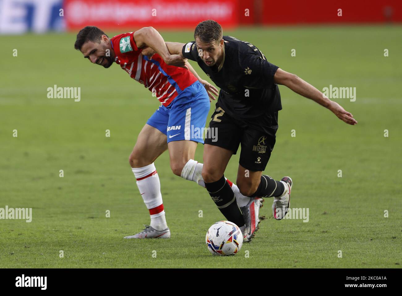 Antonio Puertas e Lejeune durante la partita la Liga tra Granada CF e Deportivo Alaves allo stadio Nuevo Los Carmenes il 20 settembre 2020 a Granada, Spagna. (Foto di Álex Cámara/NurPhoto) Foto Stock