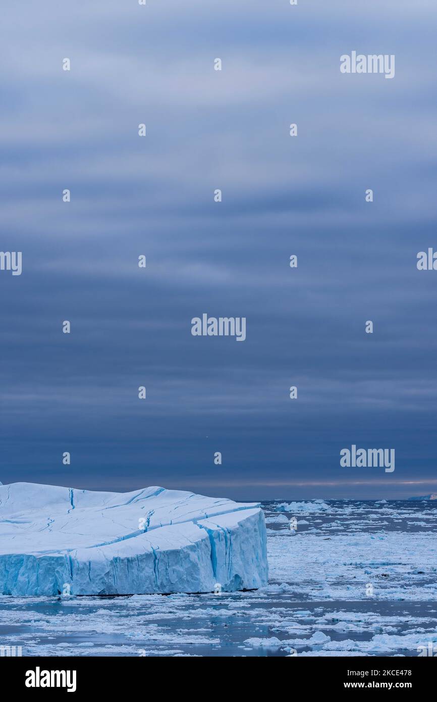 Iceberg vicino Ilulissat, Groenlandia. Il cambiamento climatico sta avendo un effetto profondo in Groenlandia con i ghiacciai e la PAC del ghiaccio in Groenlandia che si sta ritirando. (Foto di Ulrik Pedersen/NurPhoto) Foto Stock