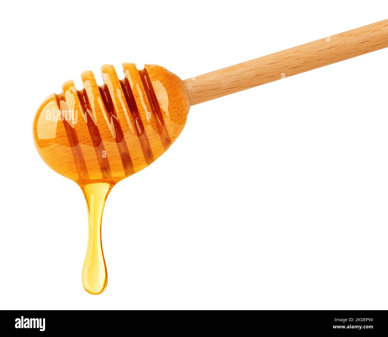 Miele che sgocciola isolato su sfondo bianco, percorso di ritaglio, profondità di campo completa Foto Stock