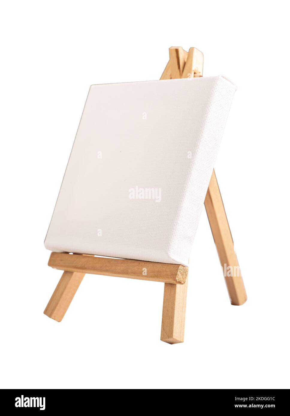 Modello in tela bianca, mockup su mini cavalletto in legno isolato su sfondo bianco. Foto di alta qualità Foto Stock
