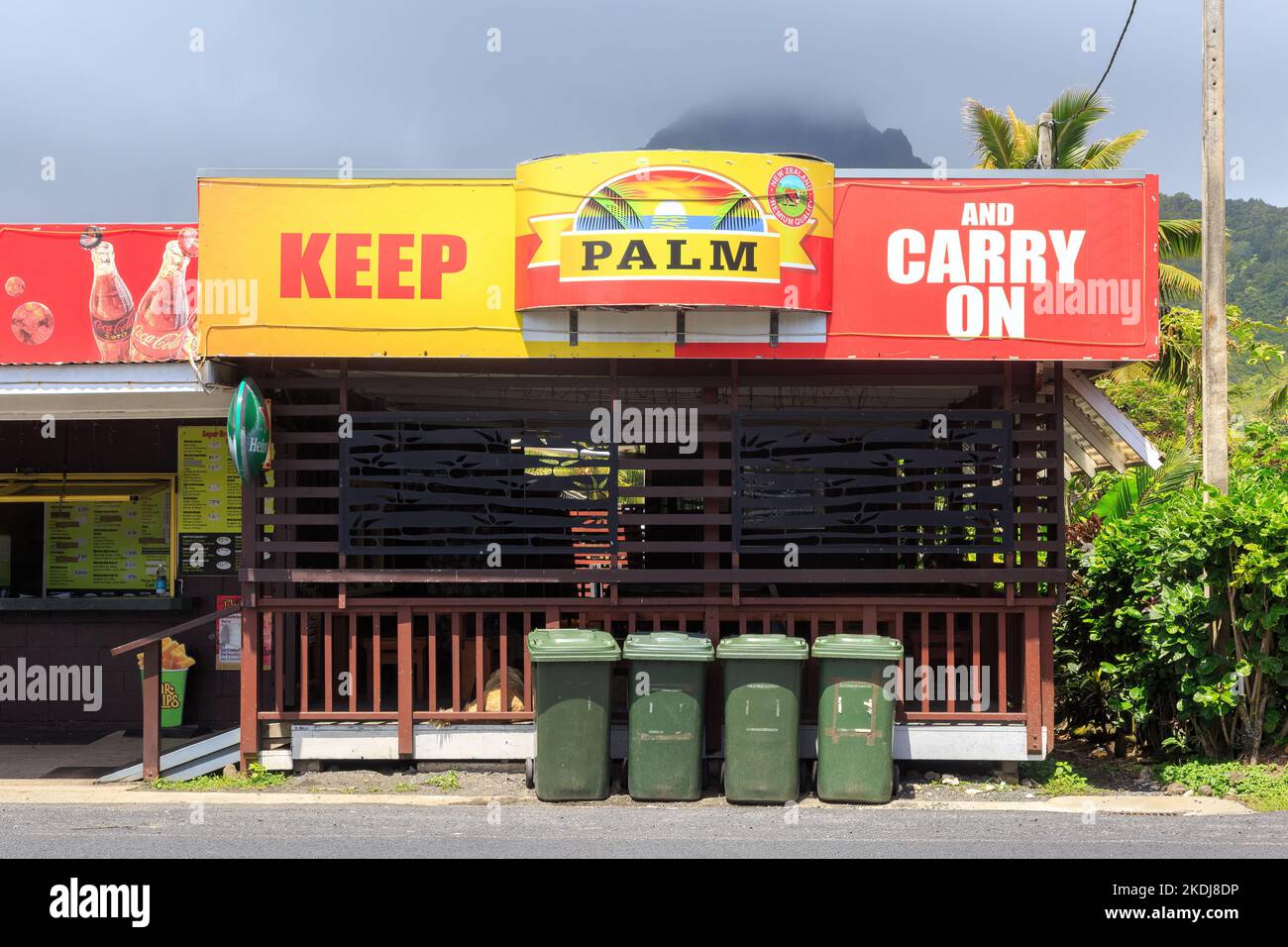 "Keep Palm and Carry on", una pubblicità per la carne di manzo in corna di palma in un edificio a Rarotonga, una delle Isole Cook Foto Stock