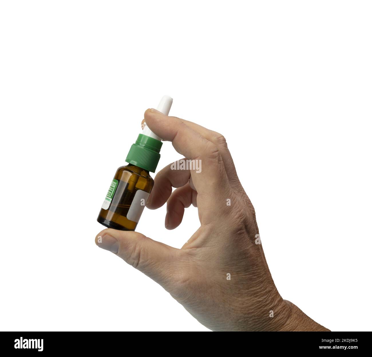 una mano maschio con un flacone spray di medicinale su sfondo trasparente Foto Stock