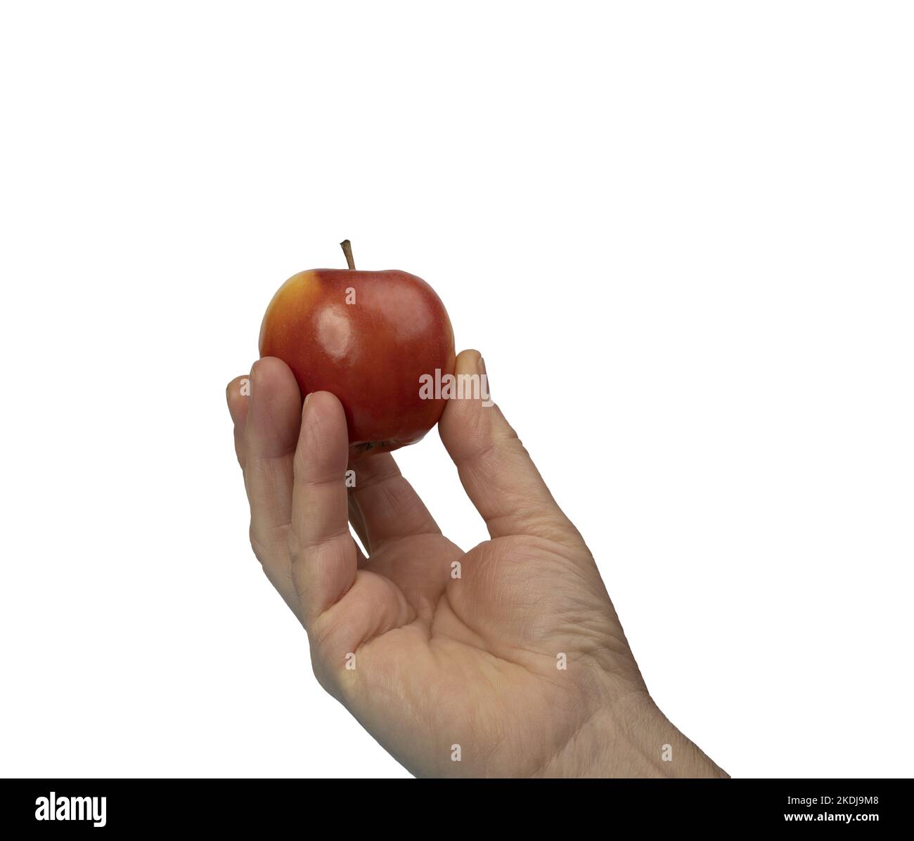 una mano maschio con una mela piccola su fondo trasparente Foto Stock