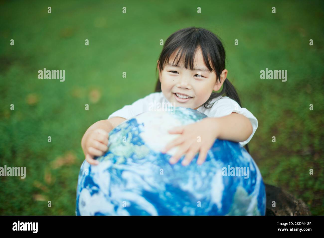 Bambino giapponese al parco cittadino Foto Stock