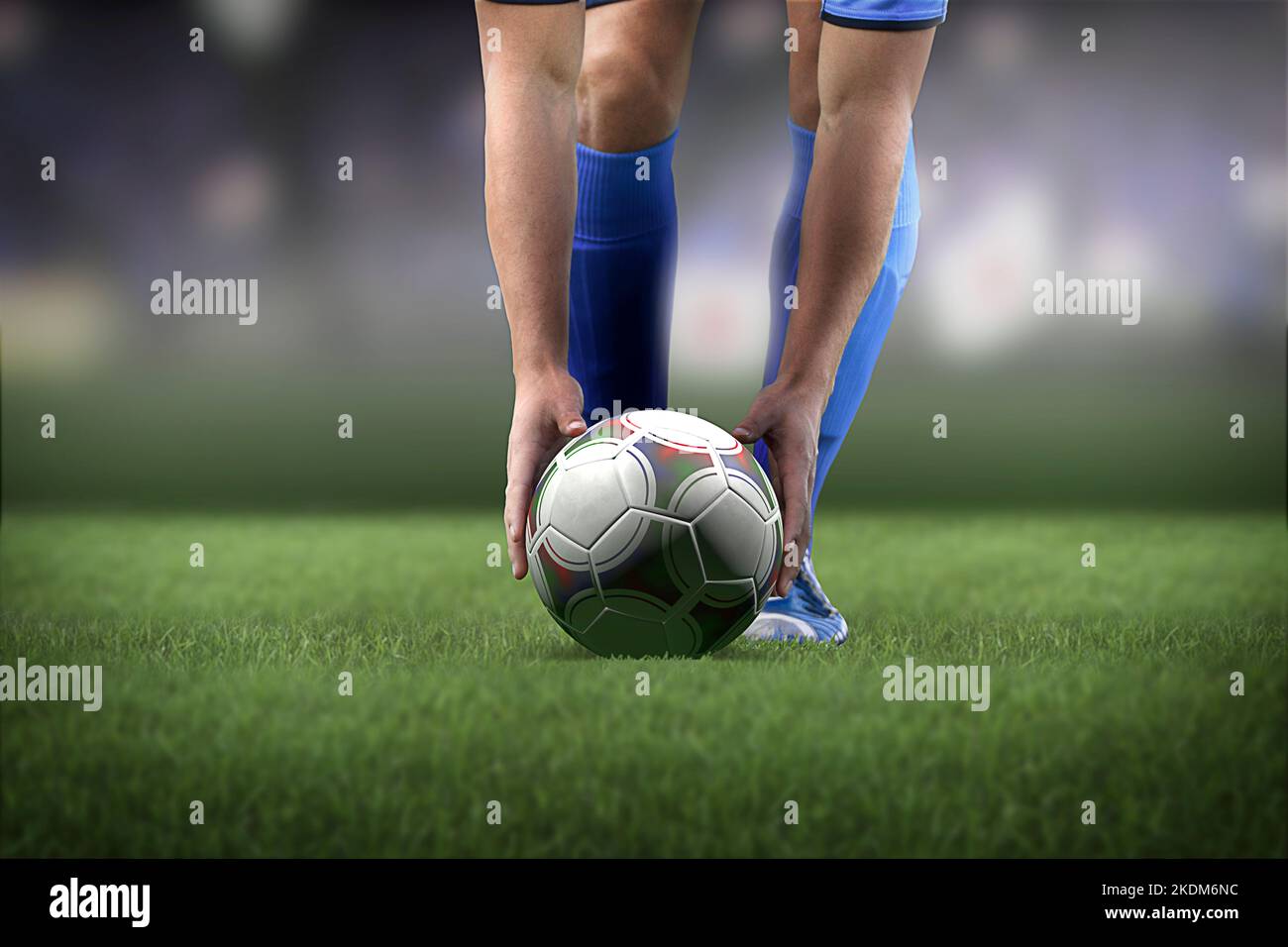 Giocatore di calcio che posiziona la palla Foto Stock