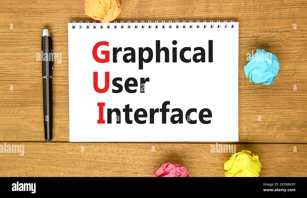 Simbolo dell'interfaccia grafica utente. Concept Words interfaccia grafica utente su nota bianca su uno splendido sfondo in legno. Grafico aziendale e GUI Foto Stock