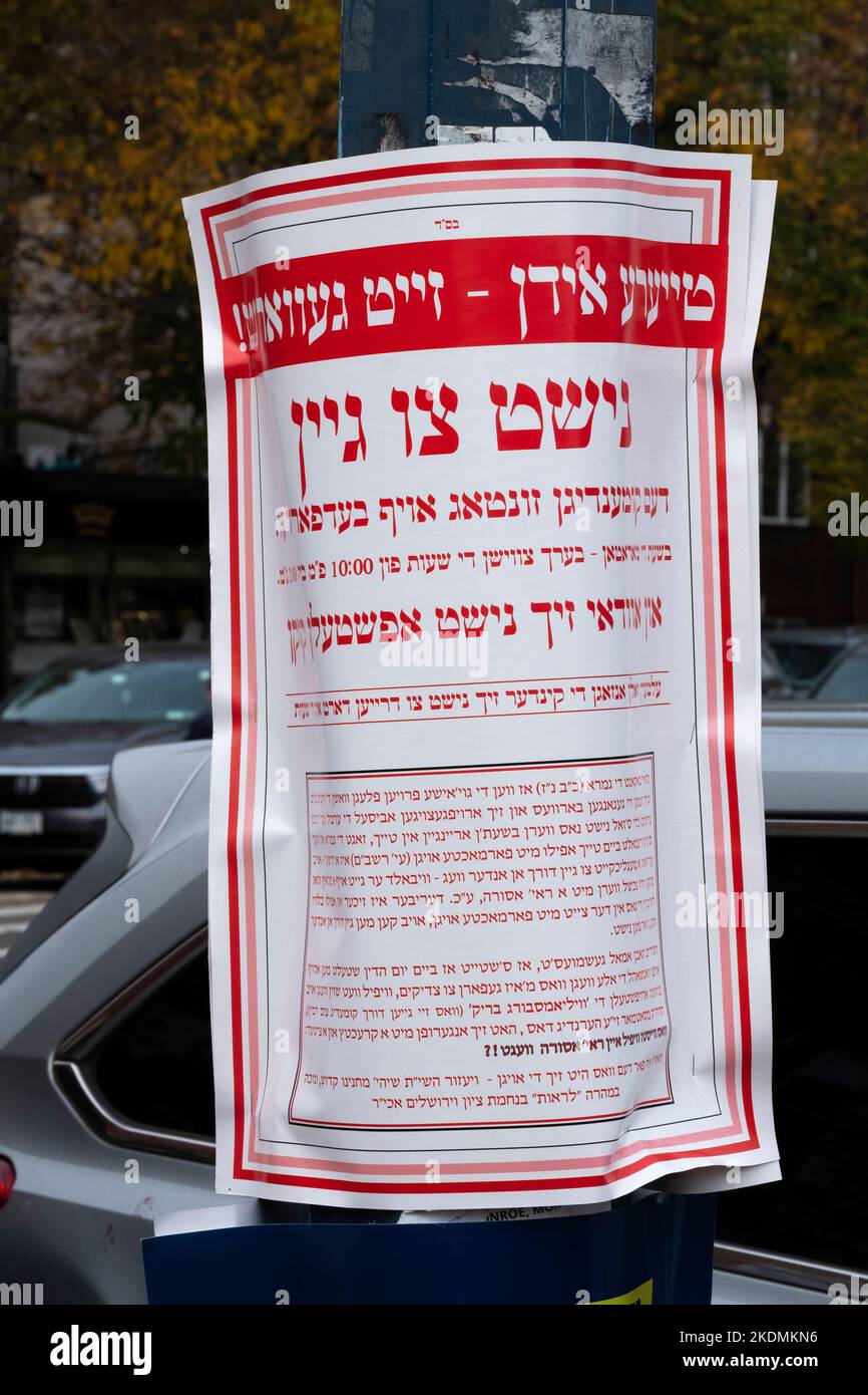 Yiddish segno a Williamsburg, Bklyn consigliando agli ebrei nel quartiere di evitare Bedford Ave Domenica 11.6.22 perché è sul corso di NY Marathon. Foto Stock