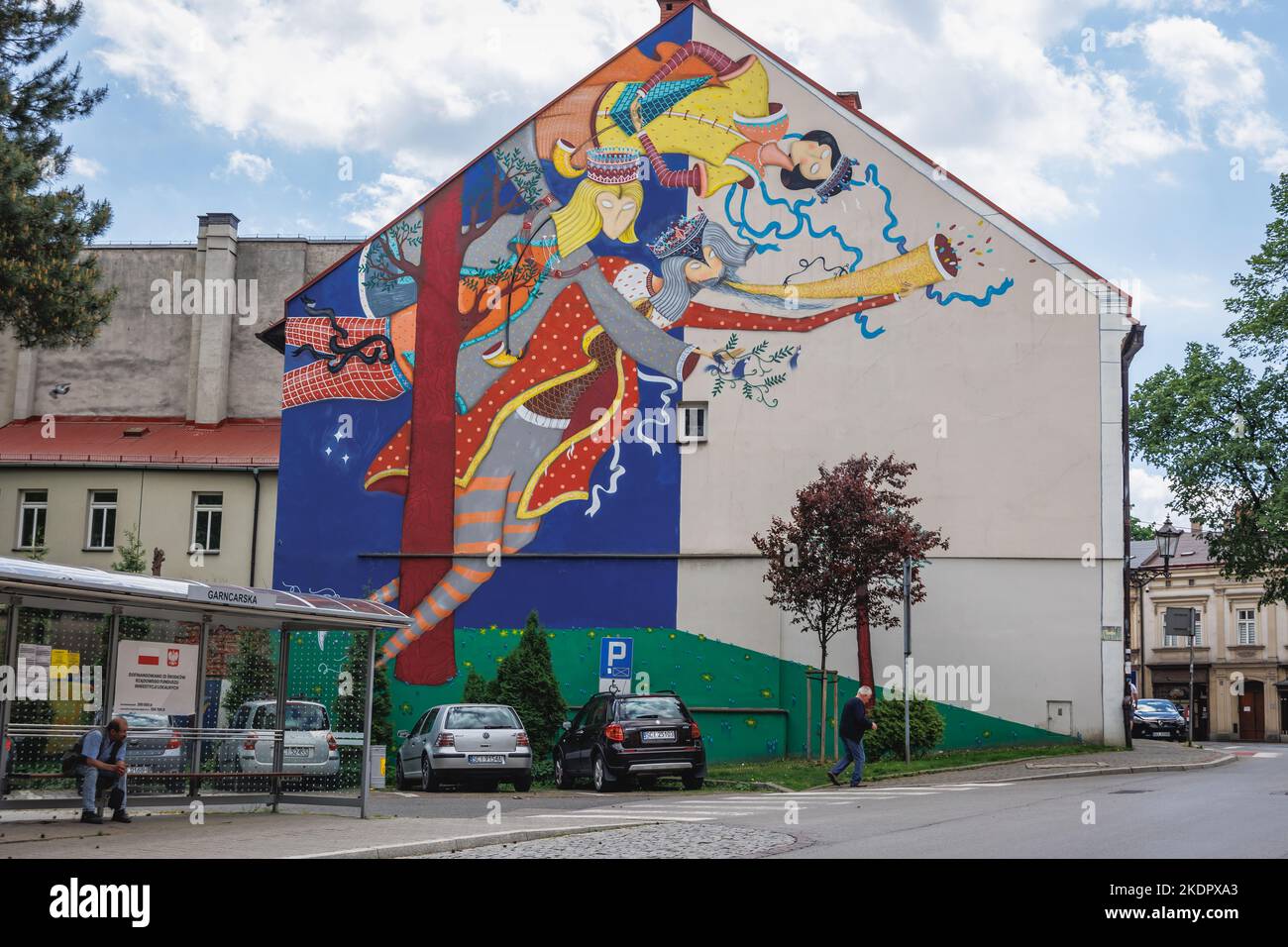 Murale nella città vecchia di Cieszyn città di confine in Polonia, con il motivo regionale della leggenda di tre fratelli Foto Stock