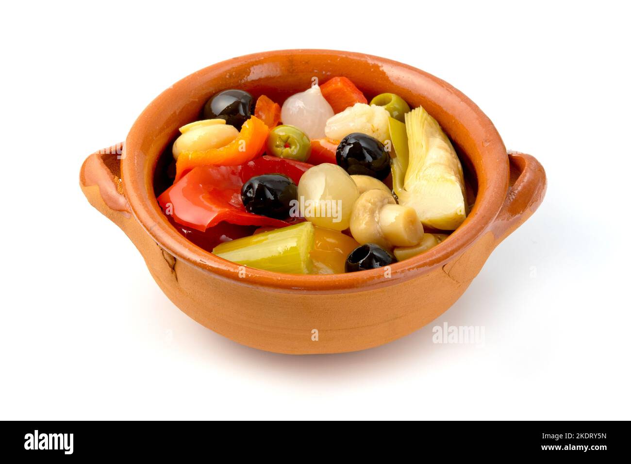 Verdure miste in un recipiente di argilla Foto Stock