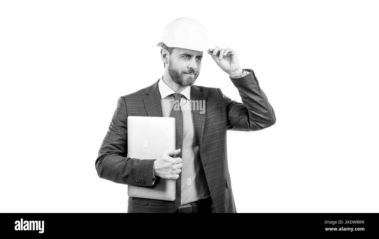 uomo boss maturo isolato su bianco. sicurezza business. protezione dati. sicurezza internet. uomo d'affari in casco con laptop. architetto che lavora su progetto Foto Stock