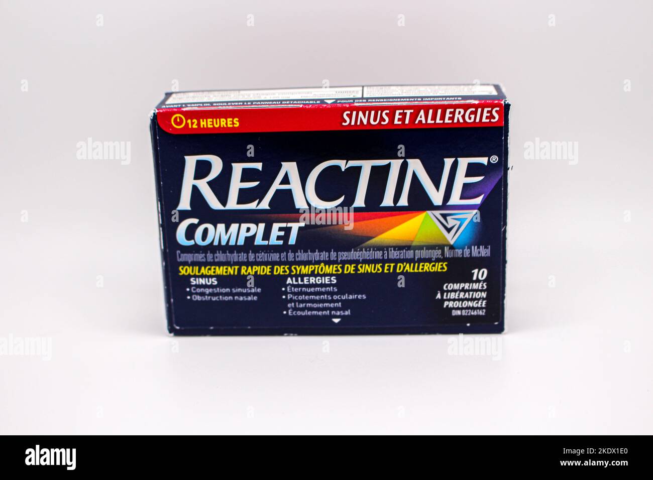 Reactine completa allergia medicina in francese parole scritte sulla scatola in Surrey, BC Foto Stock