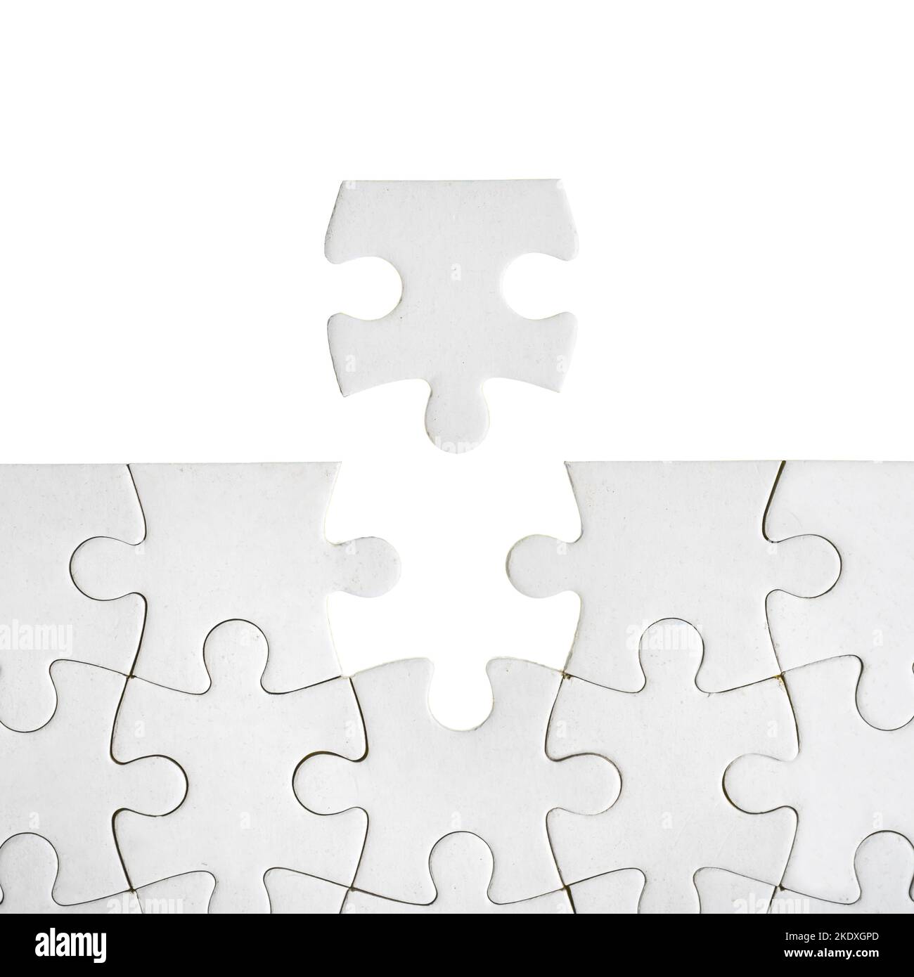 un pezzo del puzzle da collegare con gli altri pezzi per formare la composizione finale su uno sfondo trasparente Foto Stock