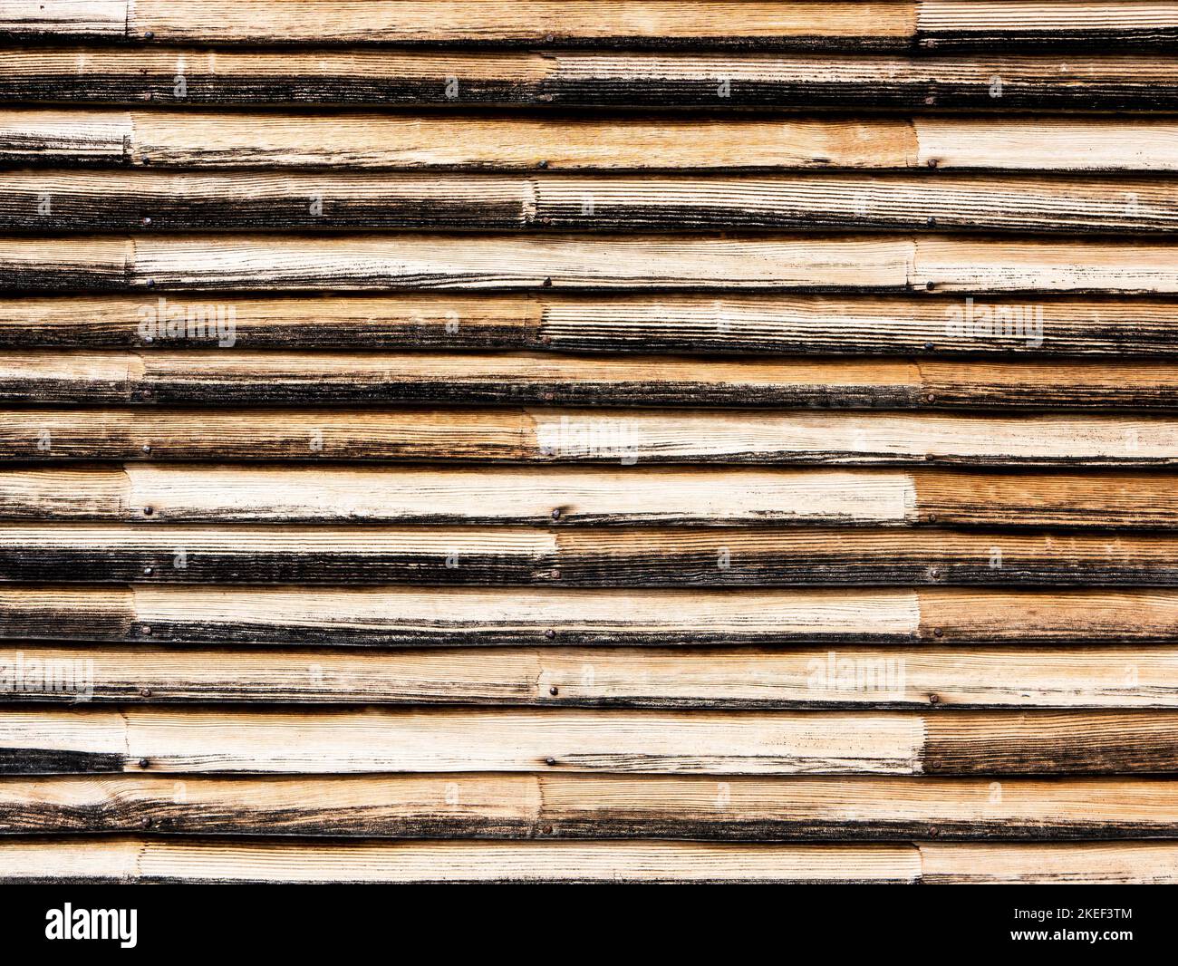 La struttura di un muro di legno molto vecchio legno. Foto Stock