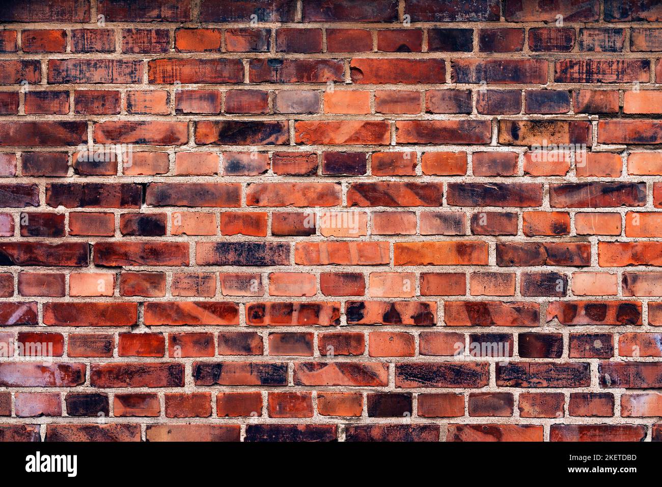 Modello di mattonelle di mattoni di clinker rustico vetrificato come sfondo. Dettaglio in stile architettonico scandinavo da Halmstad in Svezia. Foto Stock