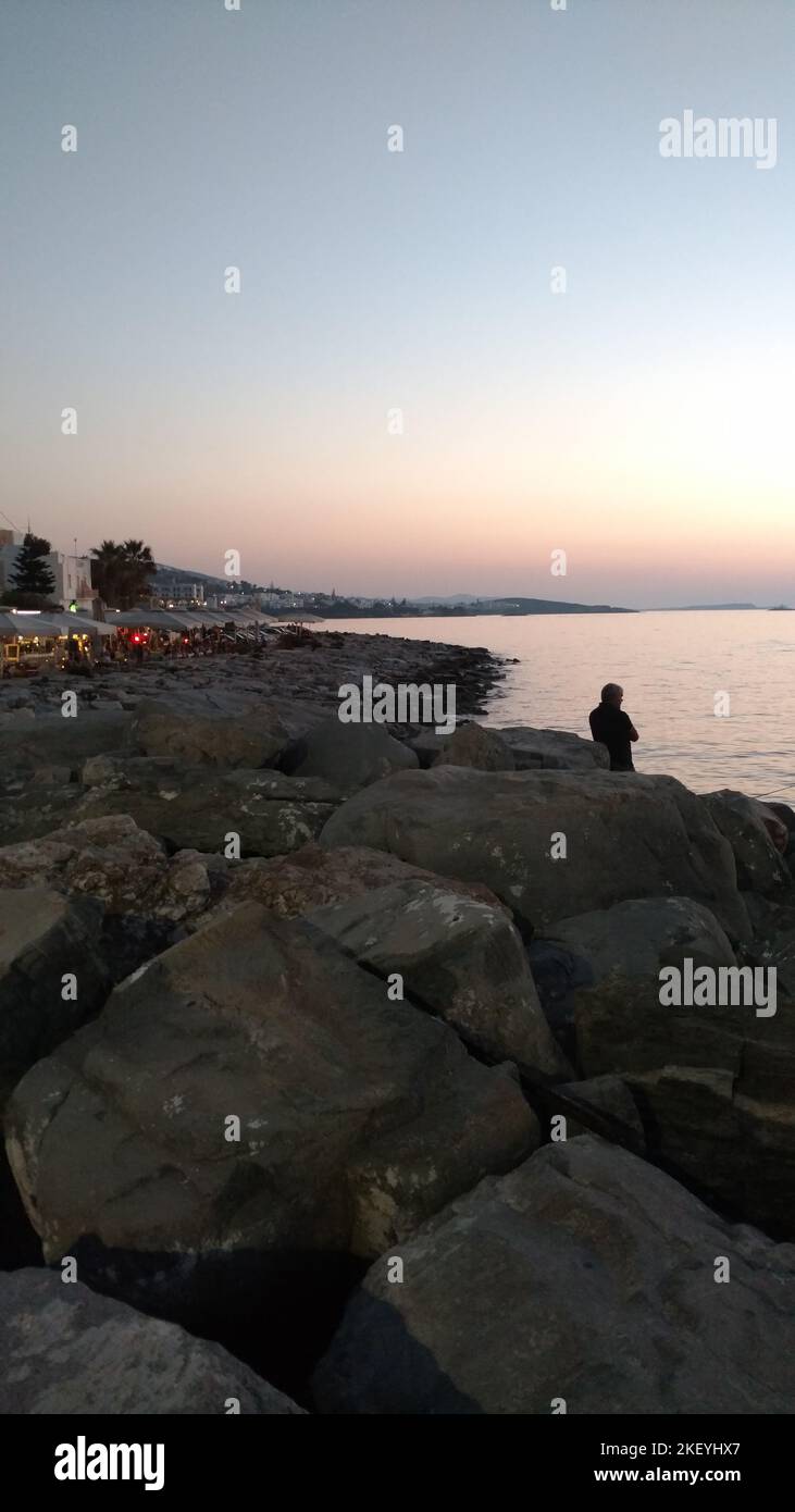 Pescatori Angler tramonto Paros Grecia isola mediterranea egeo Foto Stock