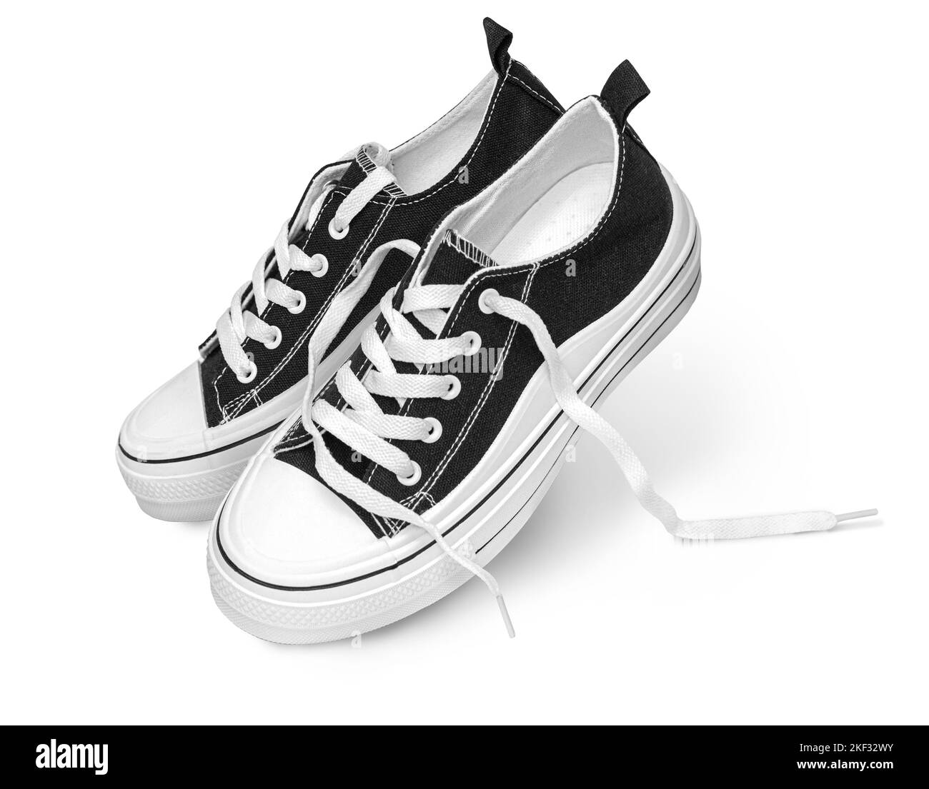 Nuove sneaker classiche per la scuola su sfondo whita, Foto Stock