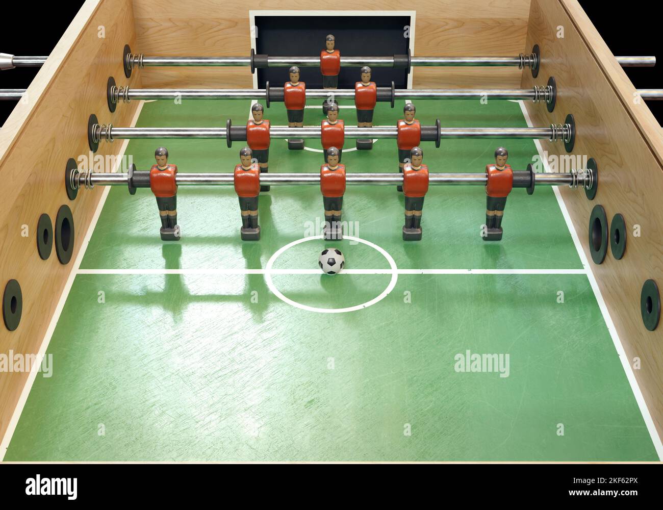 Un lato di un calcio d'epoca o di un tavolo da calcio da tavolo con figure in metallo indossate in kit che assomigliano alla nazionale belga - resa 3D Foto Stock