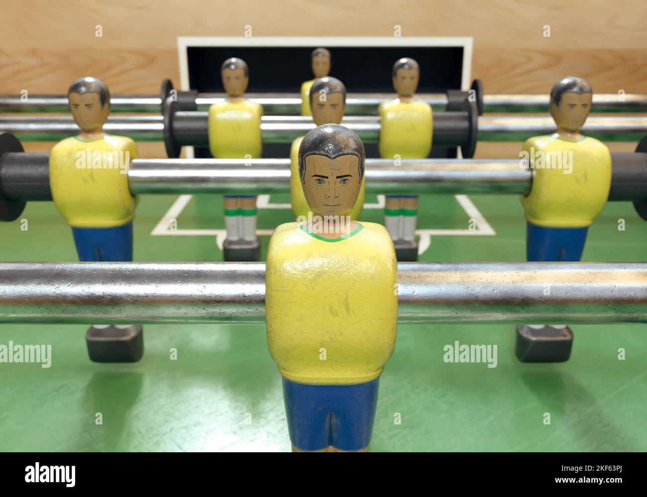 Un lato di un calcio d'epoca o di un tavolo da calcio con figure in metallo indossate in stile kit che assomigliano alla nazionale brasiliana - rendering 3D Foto Stock
