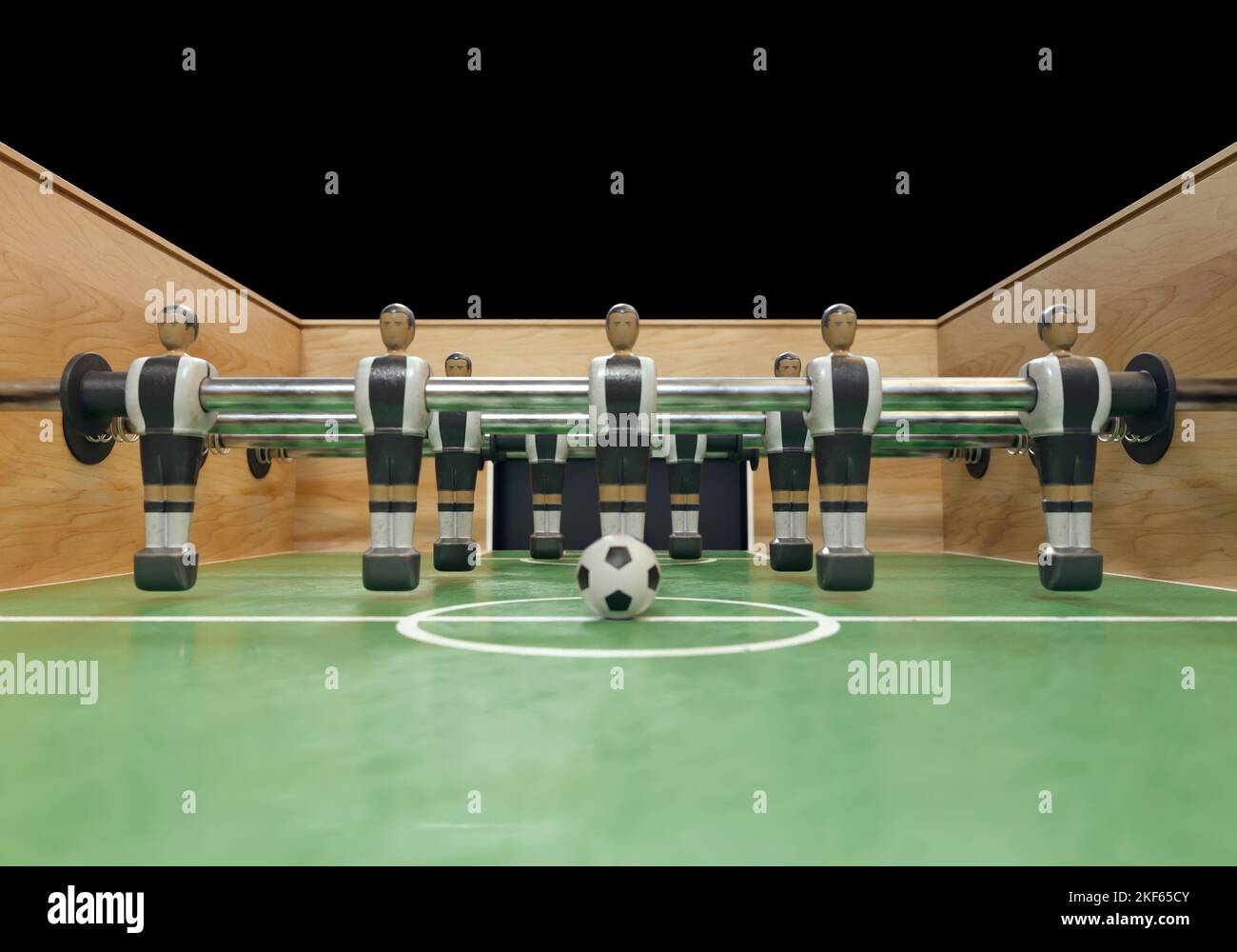 Un lato di un football vintage o tavolo da calcio con personaggi in metallo indossati in kit che assomigliano alla nazionale tedesca - rendering 3D Foto Stock