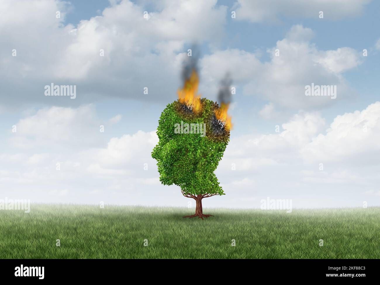 La consapevolezza della malattia di Alzheimer e la malattia di demenza come concetto di salute mentale come un albero che brucia a forma di testa umana Foto Stock