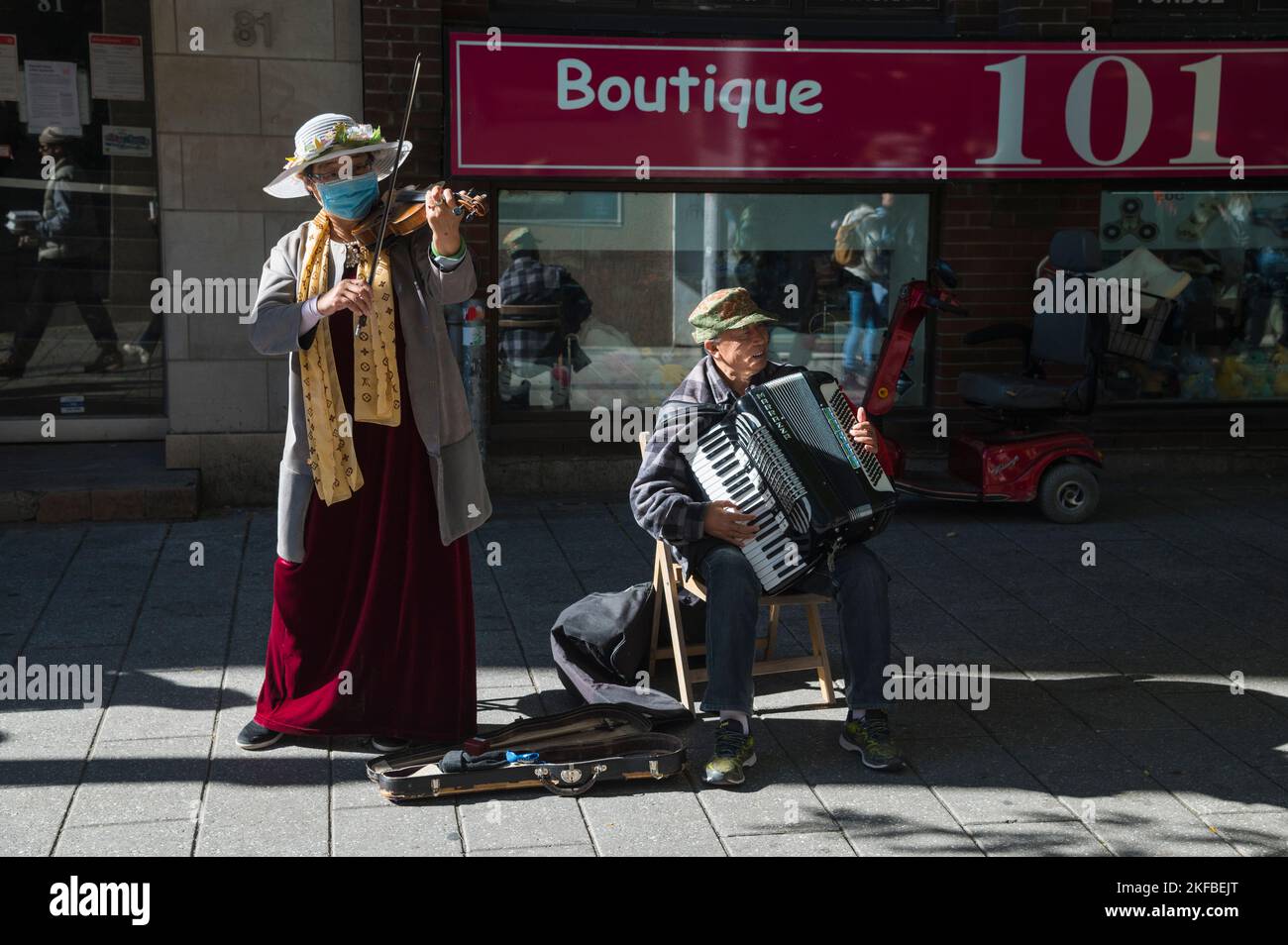 Musicisti di strada, Chinatown, Montreal, Quebec, Canada Foto Stock