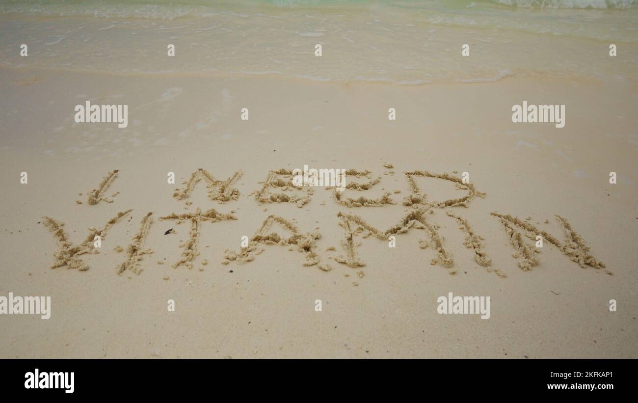 Tropical Beach Travel Vitamin D messaggio scritto a mano Foto Stock