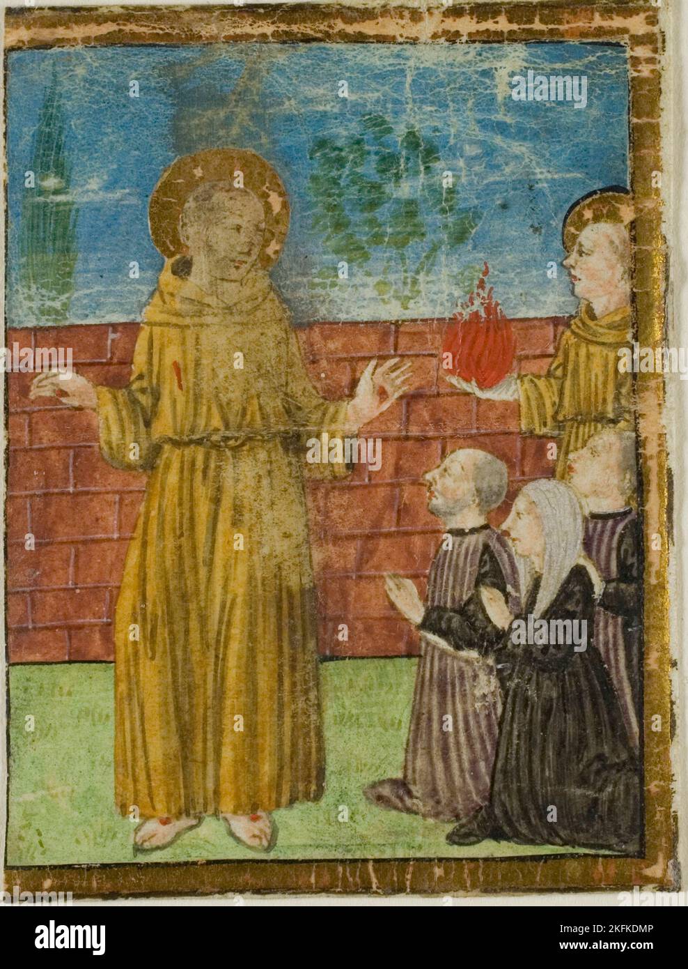 San Francesco d'Assisi con i donatori in un iniziale storiato da un manoscritto non identificato, c.. 1400. Foto Stock