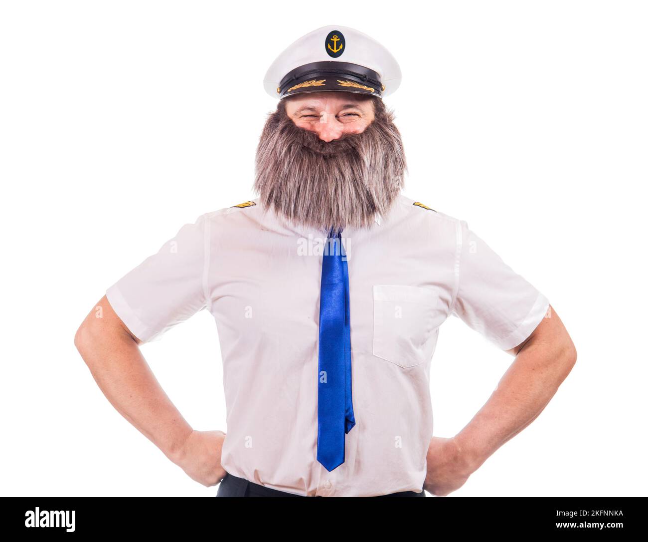 Marinaio beared in uniforme sorridente alla macchina fotografica Foto Stock