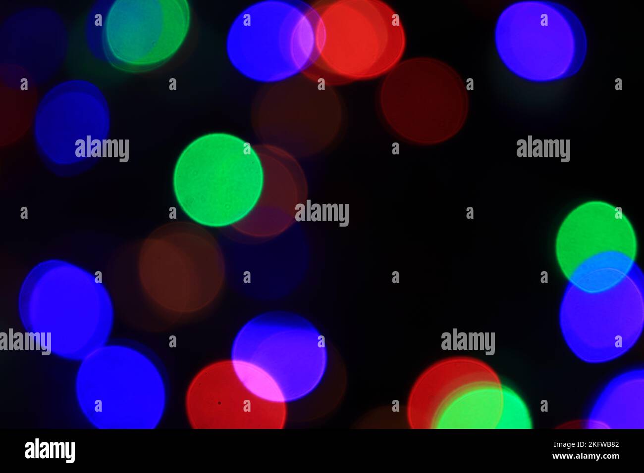 I cerchi colorati di luce sullo sfondo astratto Foto Stock