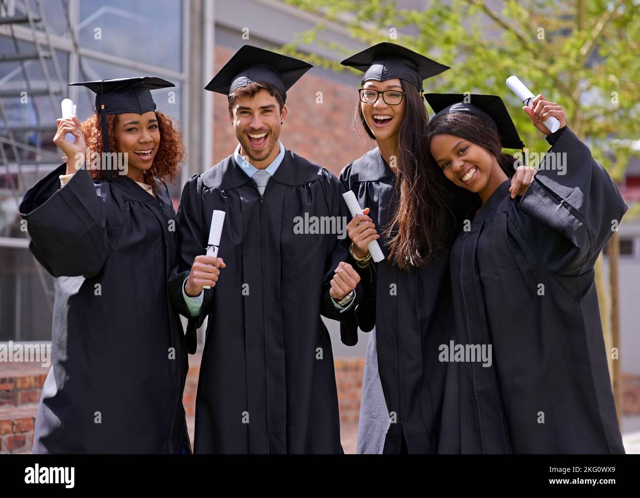 Cerimonia di laurea. Gli studenti universitari festeggiano il giorno della laurea. Foto Stock