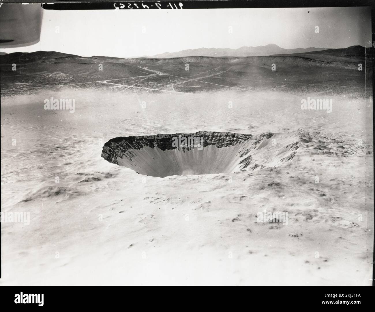 Progetto 30-110 - attività di test in berlina (Nevada Test Site). CRATERE DI SEDAN, aereo obliquo verso nord, D+20 giorni. Fotografie di Atmospheric Nuclear Testing a Pacific Island e Nevada Test Sites. Foto Stock