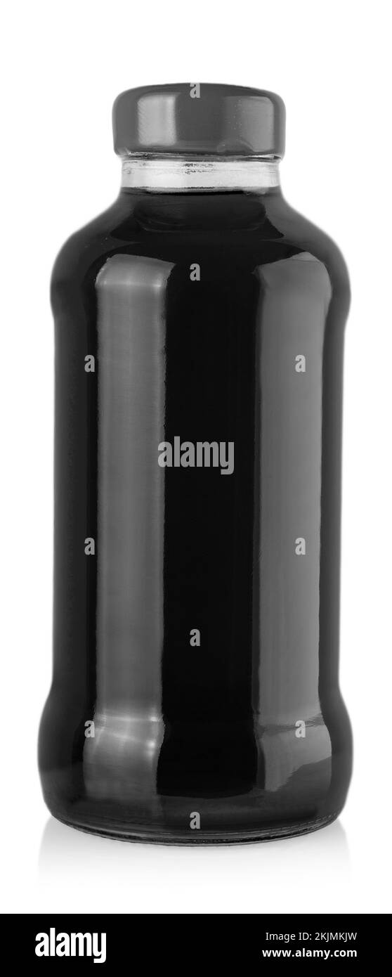 La bottiglia di succo di primo piano isolata su sfondo bianco Foto Stock