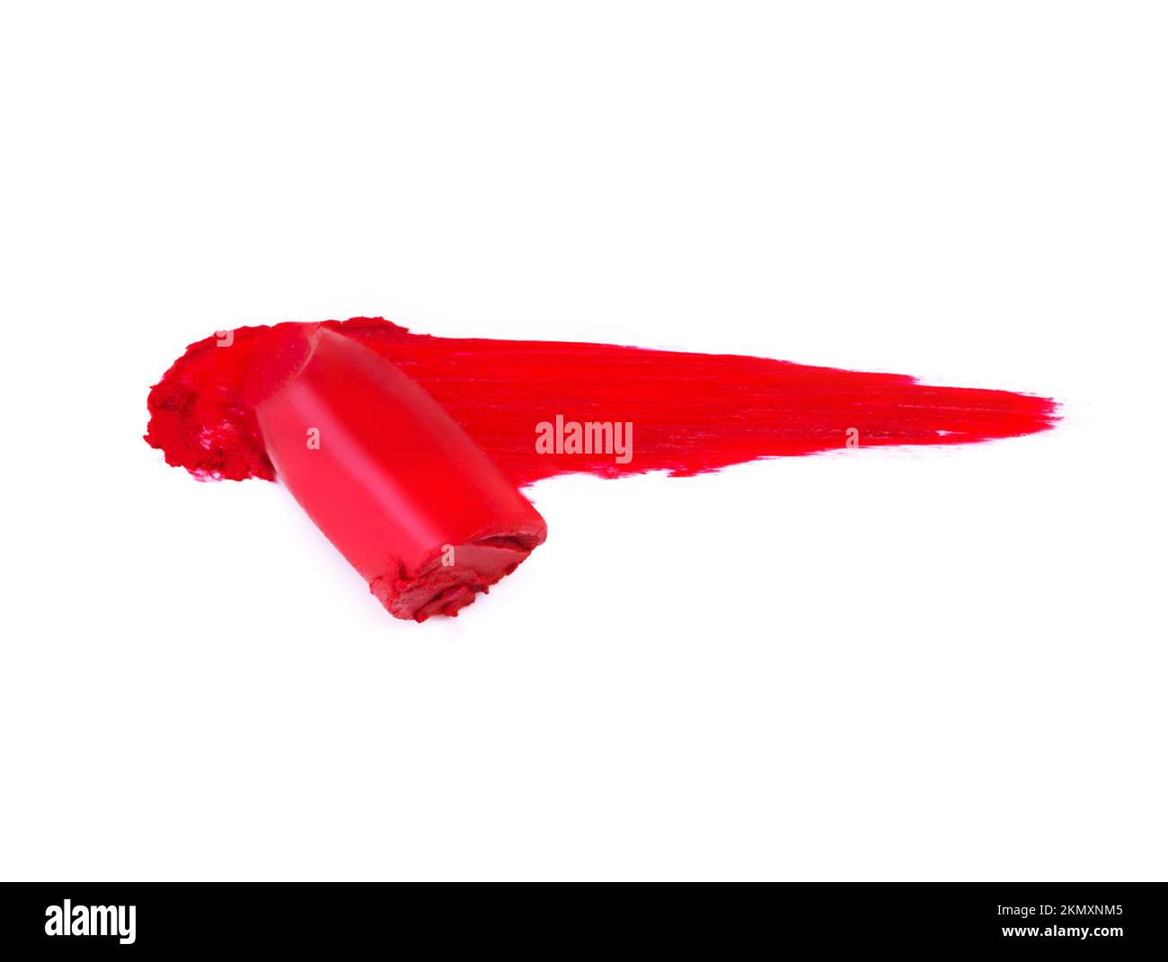 Solo un tocco di colore. Un bastone di rossetto rosso che stride una parte posteriore bianca. Foto Stock