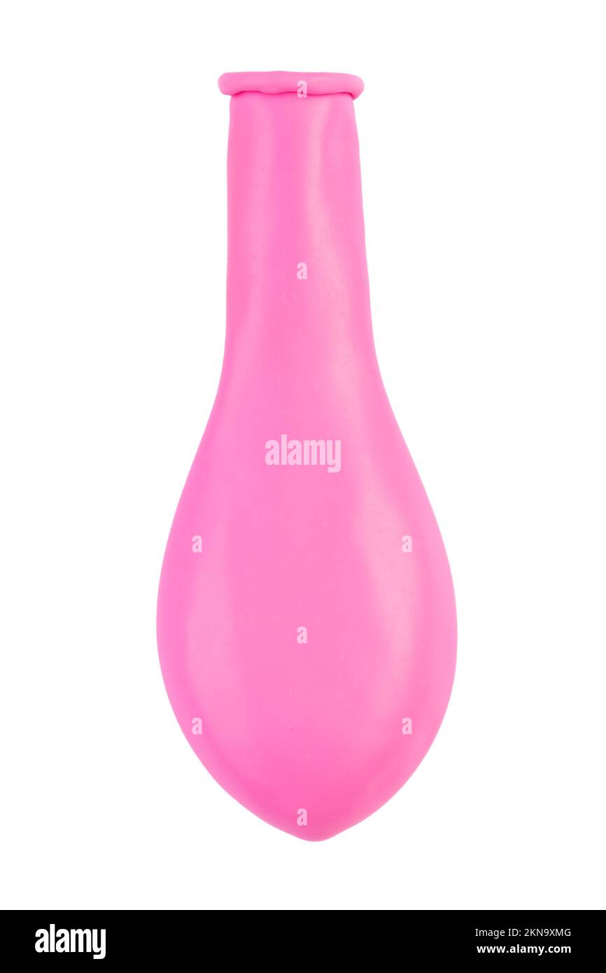 Palloncino rosa senza aria. Nuovo palloncino colorato isolato su sfondo bianco. Oggetto per arredamento festa di compleanno. Il file contiene il percorso di ritaglio. Foto Stock