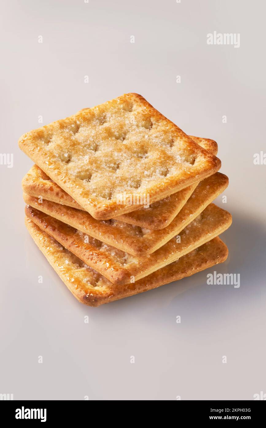 Un mucchio di cinque cracker dolci cosparsi di zucchero Foto Stock